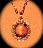 Amber mounted in 14k gold.JPG